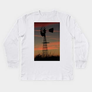 Christmas Sunset with a Windmill silhouette and clouds. Kids Long Sleeve T-Shirt